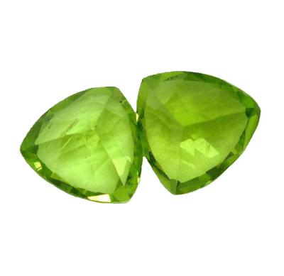 China 0.48carat Peridot Loose Gemstones Trillion For Peridot Rings 5mm for sale