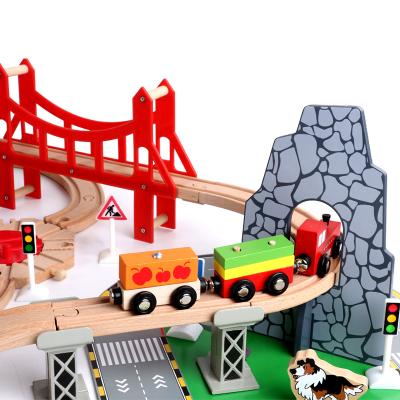 China Slot Toy 100 Pieces Wooden Puzzle DIY Building Block Toys Big Beech Train Track Set Toy Juguetes De madera for sale