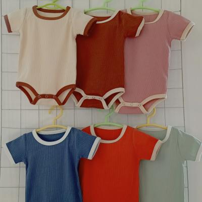 China Wholesale Short Loose Ribbed Overalls Cotton Sleeeves Solid Colors Fall Baby Clothes Newborn Infant Romper for sale