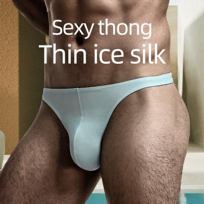 China Men's sexy thong low waist solid color u convex body ice underwear silk smooth thong sexy tight elastic men's hip elastic breathable motion thong for sale