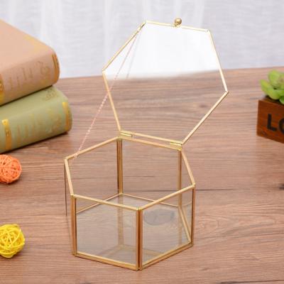 China Modern and Simple Hexagon Cover Glass Flower Piece Jewelry Box Mirror Open Geometric Jewelry Storage Box for sale