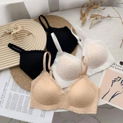 China High quality comfortable women bra newcomer beha deep v-neck one-piece solid color lace up traceless bra for sale