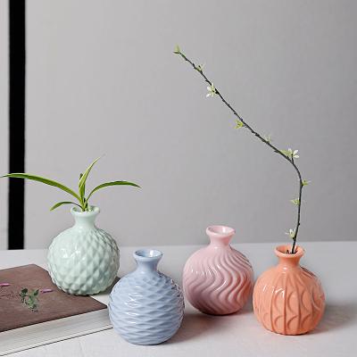 China Simple Modern European Ceramic Vase Mini Hydroponic Flower Creative Living Room Arrangement Wholesale Minimalist Vase for sale