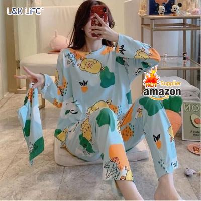 China Summer QUICK DRY Hot Selling Milk Silk Women's Sleepwear Skirt Around The Neck Cute Cartoon Printing Women Long Sleeve Pajamas for sale