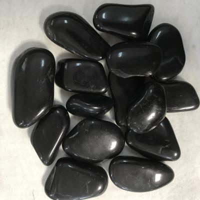 China Nanjing Modern Natural Black Glass Stone Cobblestone Landscaping Decorative Stone for sale