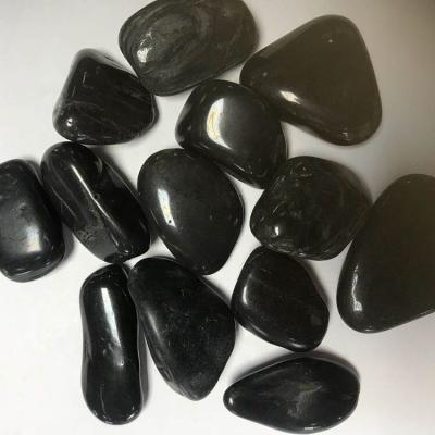 China Modern Factory Direct AAA High Polished Black Round Pebble Stone For Gardening And Landscaping Pebbles for sale