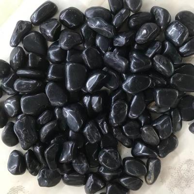 China Big Sale Traditional AAA High Polished Black Natural River Pebble Stone For Garden Landscaping And Decoration for sale