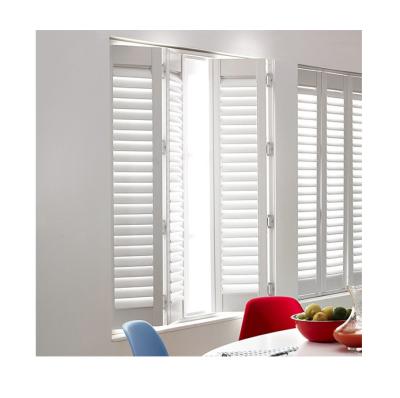 China 2019 China Track Adjustable Sliding PVC Plantation Window Shutters White Bifold Doors for sale