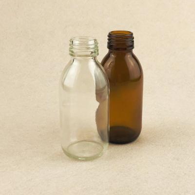 China 125ml Medicine Syrup Amber Glass Bottle With 28mm Screw Cap Clear Glass Bottle for sale