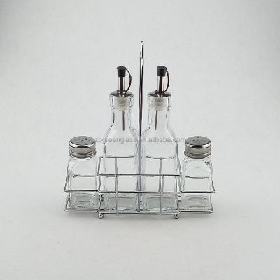 China Freshness Preservation Square Glass Spice Jars And Glass Oil Bottles Set With A Metal Tray for sale