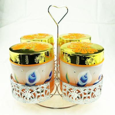 China Freshness Preservation 4pcs Glass Jar With Hand Drawn With Stand Set 700ml Jar With Plastic Lid for sale