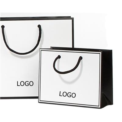 China Fashion Recyclable High Grade Luxury Paper Shopping Bag With Handles for sale