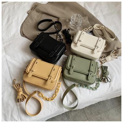 China Cheap wholesale PU ladies chain cross body bag and fashionable handbags Japan style women shoulder bags for sale