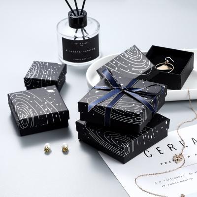 China Recyclable Silver Hot Stamping Black Jewelry Box Laser Studs Jewelry Box Packaging Box Bracelets Silver Rings Earrings for sale