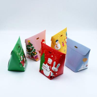 China Recycled Materials Christmas Candy Box Nougat Wrapping BoxSanta Claus Snowman Christmas Gift Box Many Colors Baking Paper Box for sale