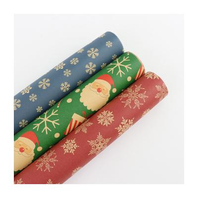 China Factory Direct Recyclable Best Prices High Quality Craft Paper For Christmas Gift Wrapping With Snowman Snowflake for sale