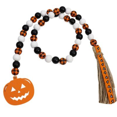 China Minimalist Halloween Decorations Pumpkin Wood Beads Garland Rustic Wooden Beaded Tassel Pumpkin Ornaments Farmhouse Tiered Tray Decor for sale