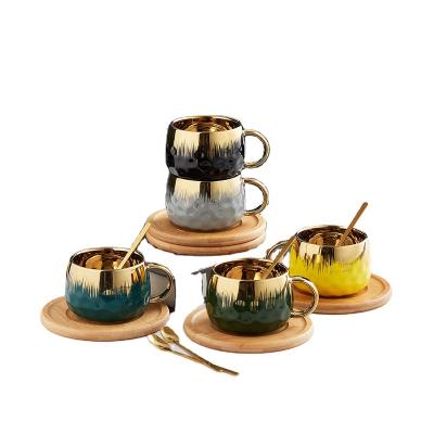 China New viable wholesale nordic ceramic coffee mugs gold handle ceramic cups tea cup and saucer sets tazas ceramic cups gold for sale