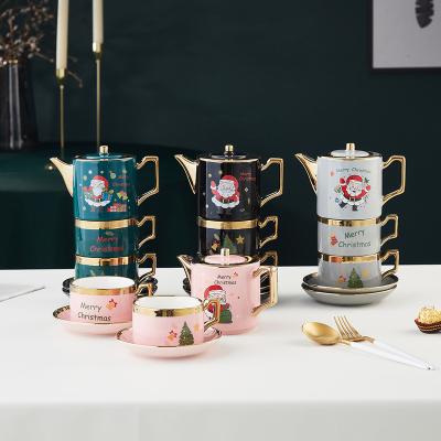 China Viable Christmas Ceramic Kettle Cup and Saucer Gift Set Santa Clause Porcelain Teapot Coffee Cup Tea Set for sale