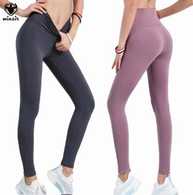 China Cheap Wholesale Women Antibacterial Naked Feeling 77 Polyester 23 Spandex Compression Waist Workout Gaiters Yoga Pants High With Custom Logo for sale