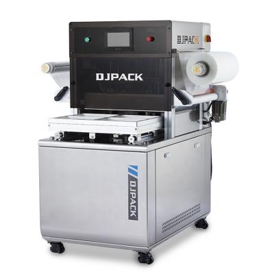 China DJL-440VS Food High Efficiency Vacuum Skin Packaging Machine Semi-Automatic One Plate Max Four Trays for sale