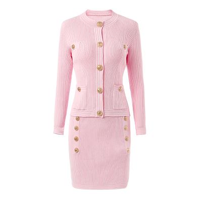 China New Viable Pink Short Slim Candy To Autumn Design Elegant Women Long Sleeve Buttons Sweater Skirt Knitting 2 Piece Sets for sale