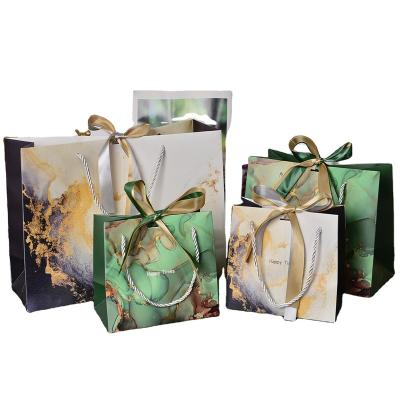 China JuYi Recyclable Customized Fashion Marble Jewelry Shopping Gift Paper Bags Luxury Paper Bags With Bow Tie Ribbon Handle Wedding Birthday for sale