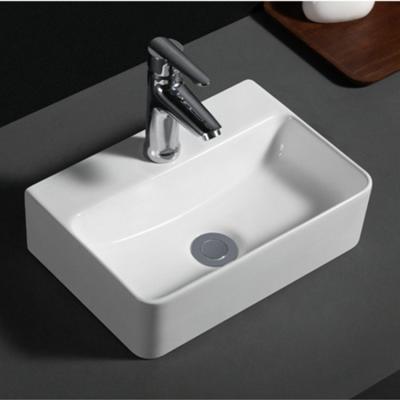 China Easy Clean European Style 525 Cheap Table Mounted Rectangle Shape Ceramic Art Basin Wash Basin for sale