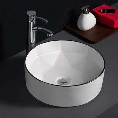 China New Design Diamond Easy Clean Cheap Black Rim Free Standing Ceramic Bathroom Basin for sale