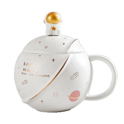 China Custom Viable Starry Planet Water Astronaut Sculpture Logo Ceramic Mug Creative Statue Cups With Lid And Spoon For Drinking for sale