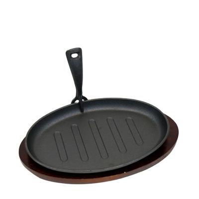 China Cast Iron Traditional Oval Fajita Sizzling Plate Steak Plate for sale