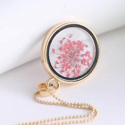 China Fashion Hot Fashion Glass Ball Four Leaf Clover Necklace Silver Chain Dried Flowers Pendant Necklaces for sale