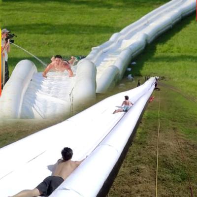 China Factory price custom world adult inflatable water slide from slope etc. longest street/beach/mountain for sale for sale