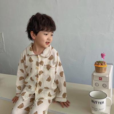 China Breathable 100% Double Layer Cotton Bear Printed Kids Pajamas Sets Long Sleeves OEM Logo Backed for sale