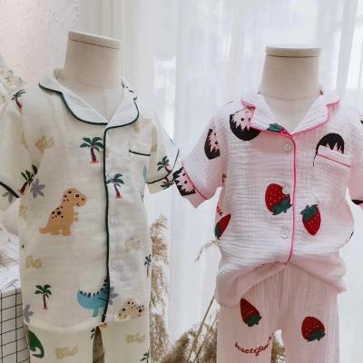 China 100% unisex girls boys children cotton breathable tropical summer palm tree pajamas sets beach style cool breeze for sale