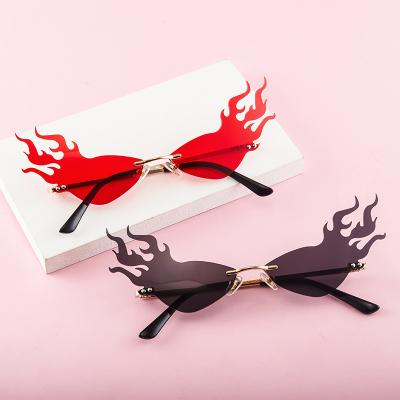 China Fashion Sunglasses 5104 Luxury Rimless Fire Flame Sun Glasses Brand Designer Cat Eye Sunglasses Women Vintage Stretching Narrow Mirror Glass Eyewear for sale