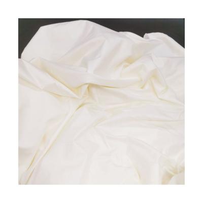 China Shrink-Resistant Smooth 95-110Gsm White Elastic 100% Polyester Imitated Silk Fabric For Dress for sale