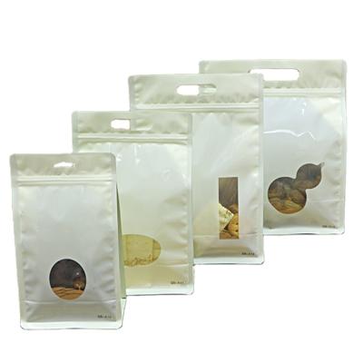 China Printed Moisture Proof Plastic Stand Up Pouches Package Bags With Window for sale