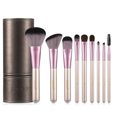 China Angular Blush Banfi 9pcs Rose Gold Makeup Brushes With Champagne Cylinder Super Soft Nylon Case Makeup Brush Kit For Women Makeup Use for sale