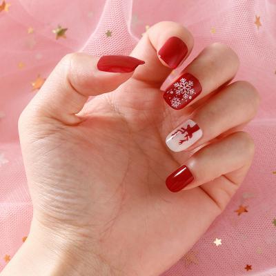 China Easy Apply 2021 12 Pairs Christmas Snow Red Self Adhesive Fake Nails Artificial Nails for sale