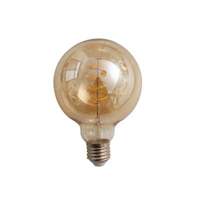 China Residential Curved Filament Globe Led Edison Light Bulb E27 G125 Dimmable Vintage Edison Round Amber Glass Lamp for sale