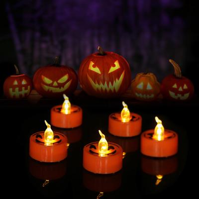 China Battery Candles For Pumpkins Mini Flameless Ghost Pumpkin Candle Battery Operated Plastic Wholesale Led Night Light Lantern for sale