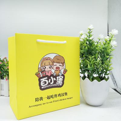 China Large a4 size yellow paper bag white paper board bags customised for sale