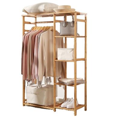 China (Size)Adjustable High Quality Bamboo Clothes Rack Garment Rack With Storage 4-Tier Shelves Eco-Friendly for sale