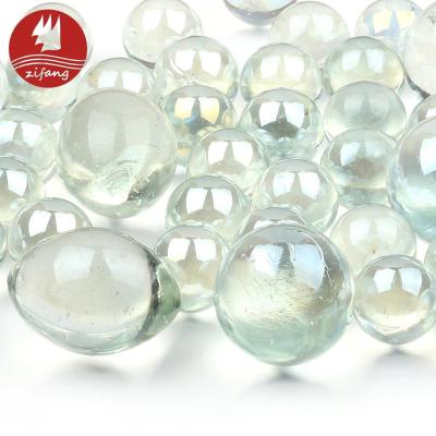 China Hot Sale Crystal Clear Glass Marble for Playing and Decorating with 16mm, 25mm, Mixed Olive Shape for sale