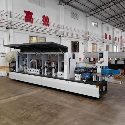 China Automatic Edge Banding Machine PM50D for Woodworking Machinery and MDF Board at 0.6Mpa for sale