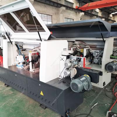 China 800 kg Weight Multifunctional CNC Edge Banding Machine with Pre-Milling and Buffing for sale