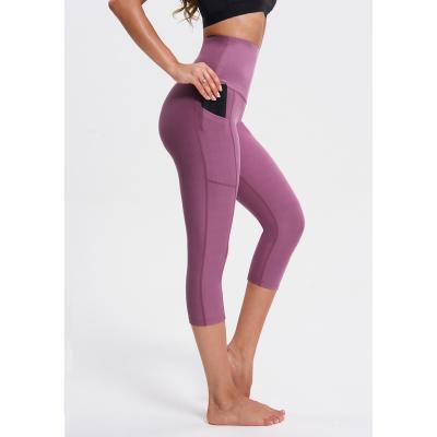 China 2022 New Women's Yoga Pants Sports Hip Peach Tight Breathable Capris Women's Quick Drying Elastic Yoga Running Capris for sale