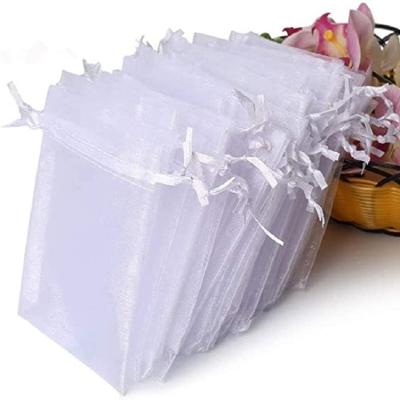 China Custom Household Gift Bags Pouch Jewelry Packaging Candy Organza Bags Portable Cheap Drawstring for sale