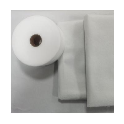 China Comfortable High Quality White Polyester Tape Stitched Nonwoven Fusible Shirt Interlining for sale